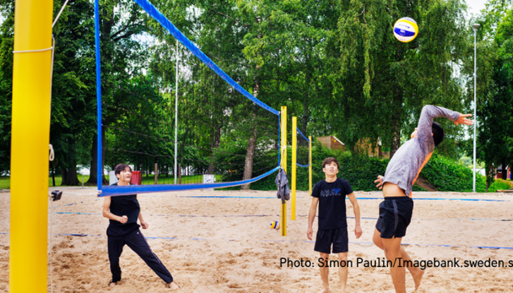 Kids playing beach volley