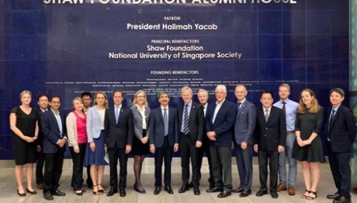 Group photo after roundtable discussion at NUS